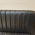 Black Leather Upholstered Bed with Textured Gold Accents, Patterned Quilted Detailing & Brass Hardware Feet